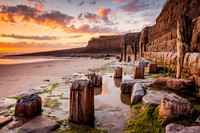 Wooden Posts with Sunset