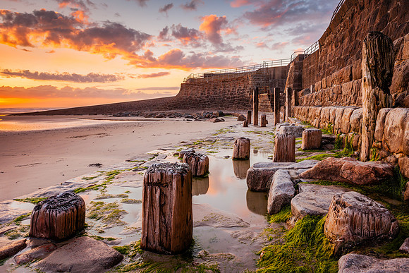 Wooden Posts with Sunset