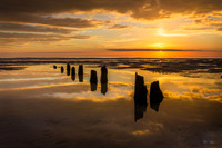 Groynes with Yellow Sunset