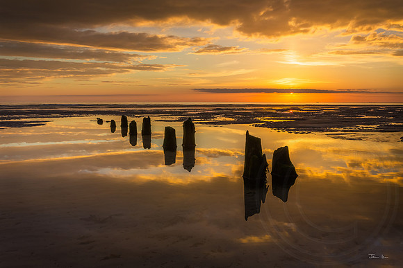 Groynes with Yellow Sunset